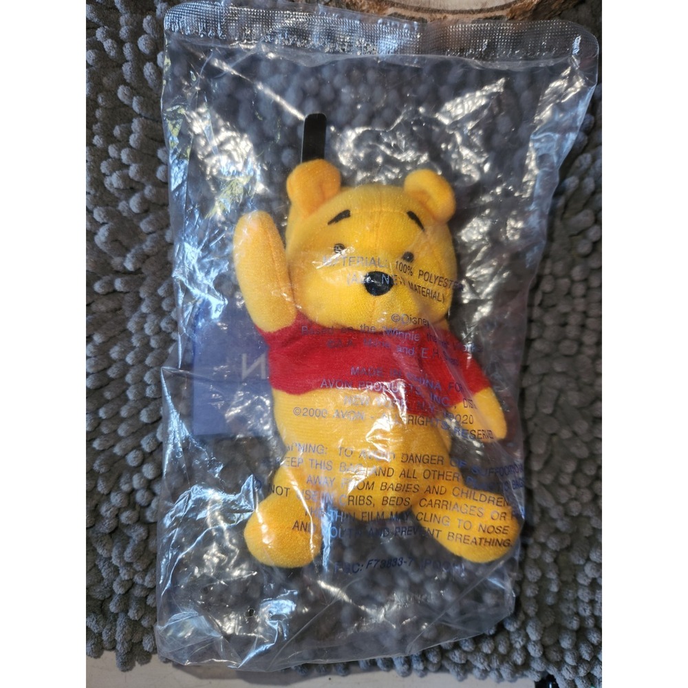 WINNIE‎ THE POOH CELL PHONE COVER BY AVON -- NEW IN BAG